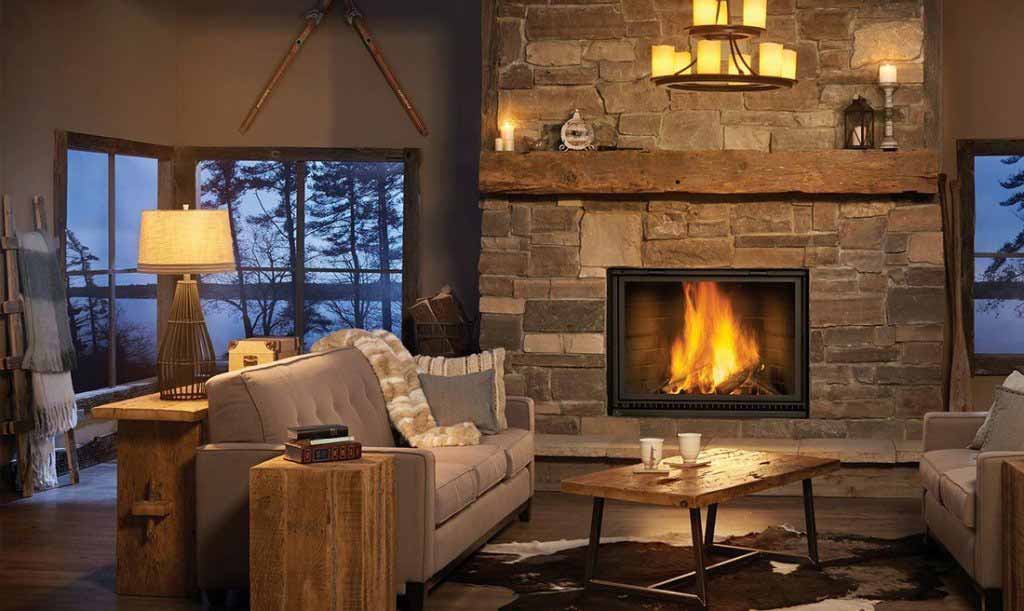 A cozy living room featuring a stone fireplace.