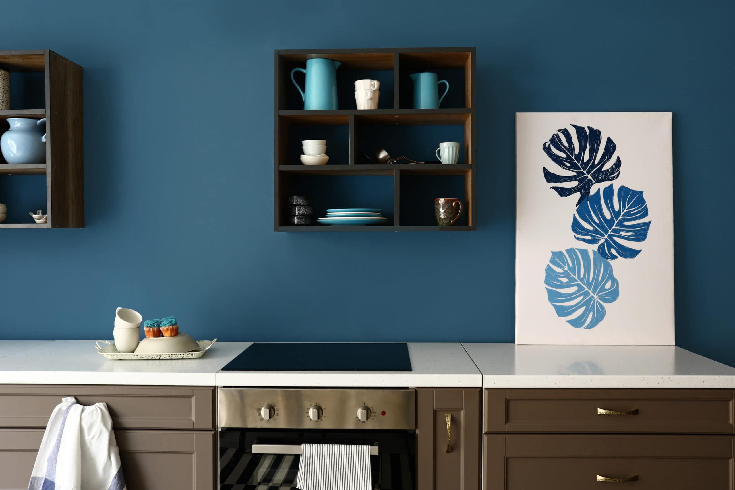 kitchen with blue base color paint