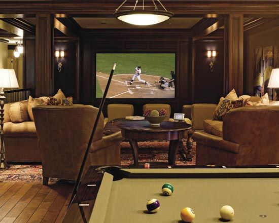 A home remodeling project featuring a pool table in a living room.
