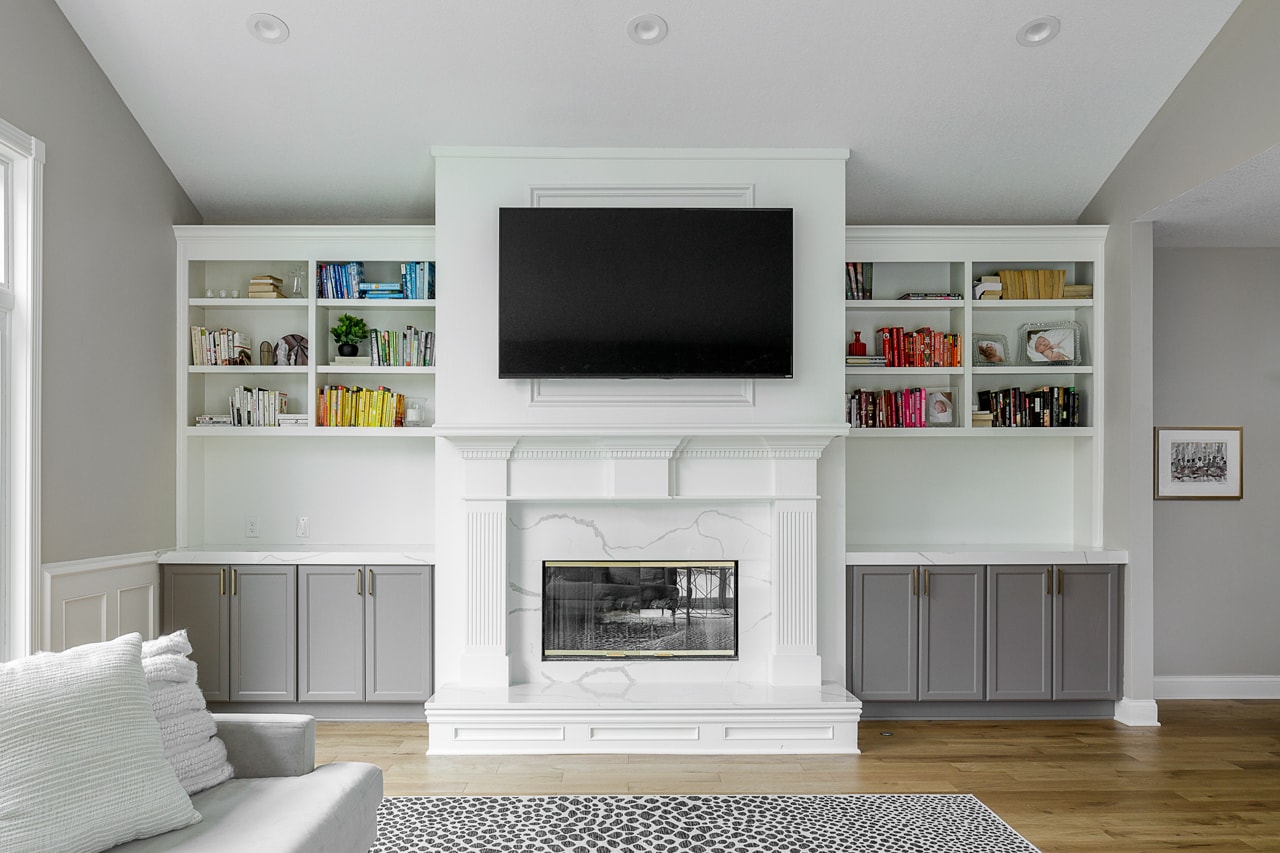 living room entertainment center with fireplace
