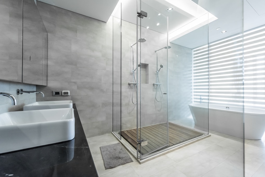Beautiful Large Bathroom with multiple shower heads 