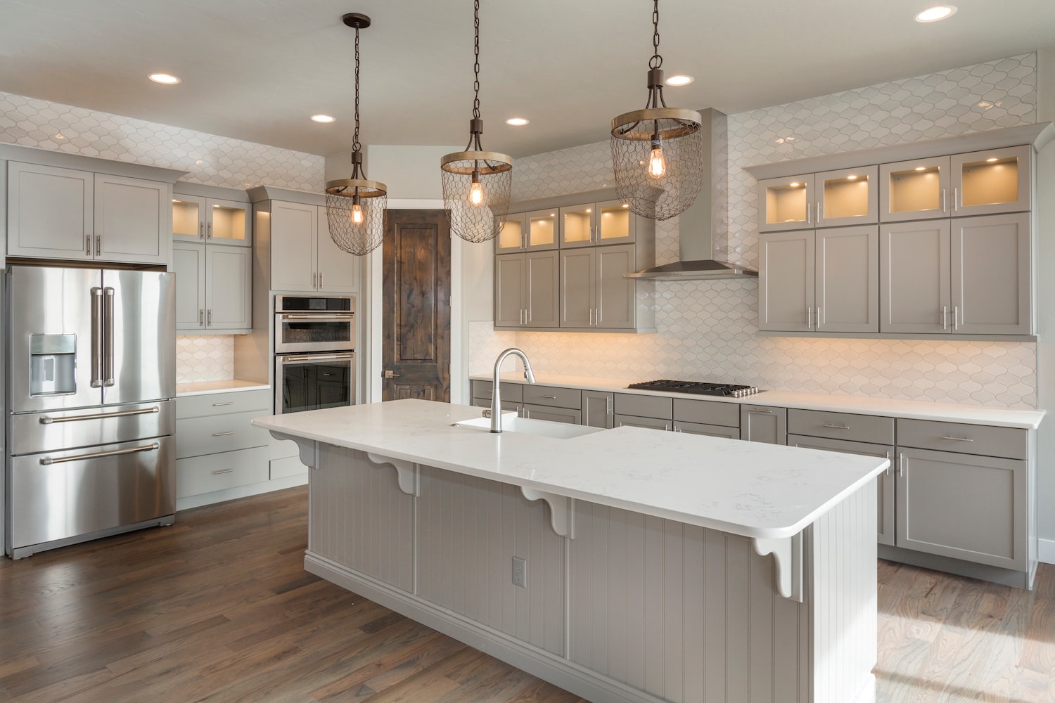 how long does a kitchen remodel take modern white finished kitchen with vintage light fixtures