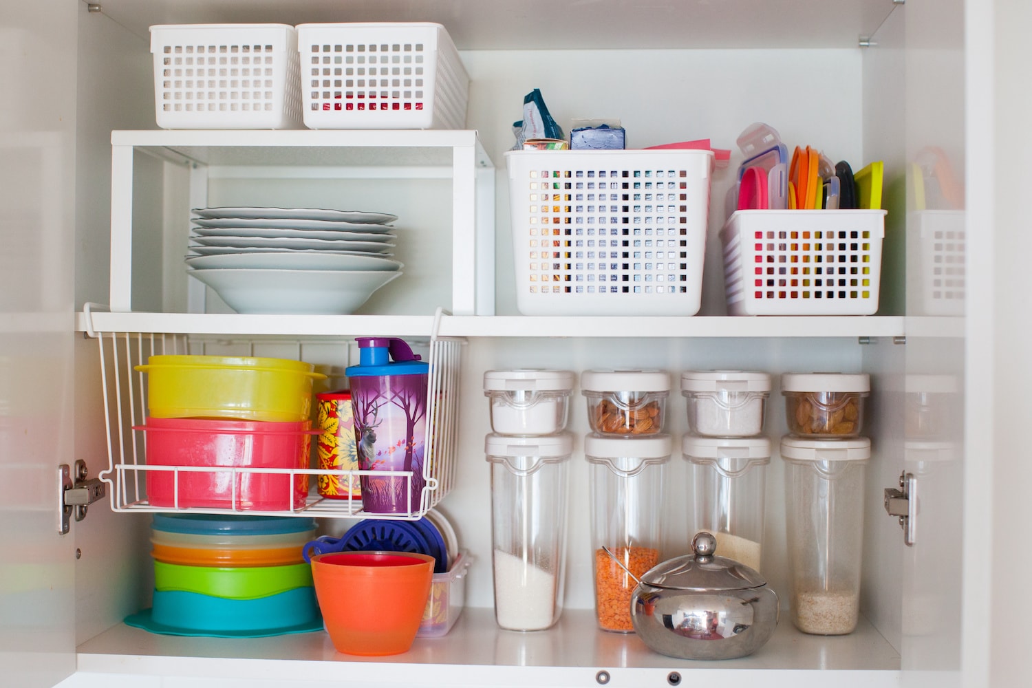 how to survive a kitchen remodel colorful organized kitchen pantry storage plates cups jars