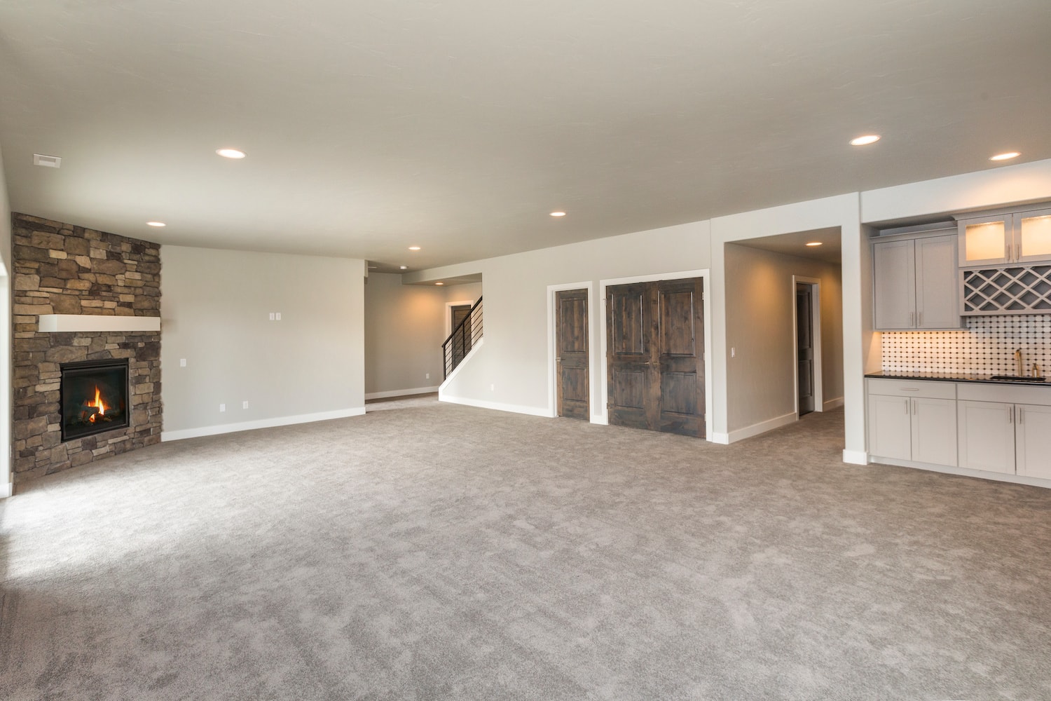 basement remodel on a budget large carpeted floor